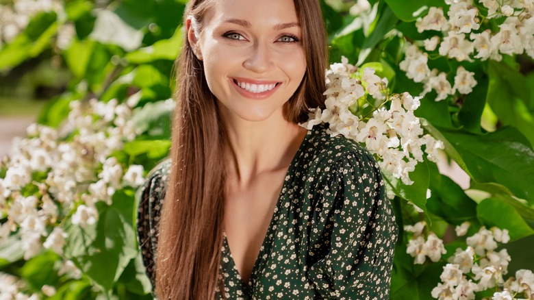 Woman near flowers