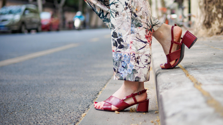 Woman on stairs in sandals 