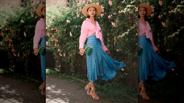 Pink shirt long blue skirt 