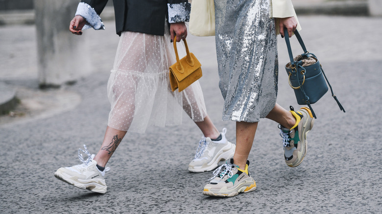 People wearing chunky sneakers