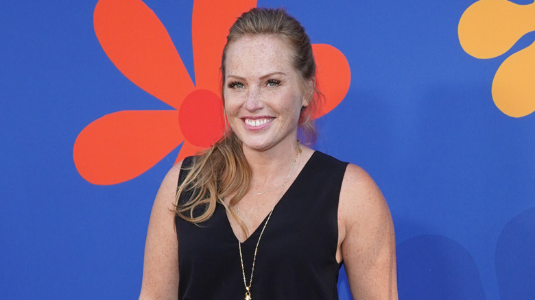 Mina Starsiak Hawk posing for photos