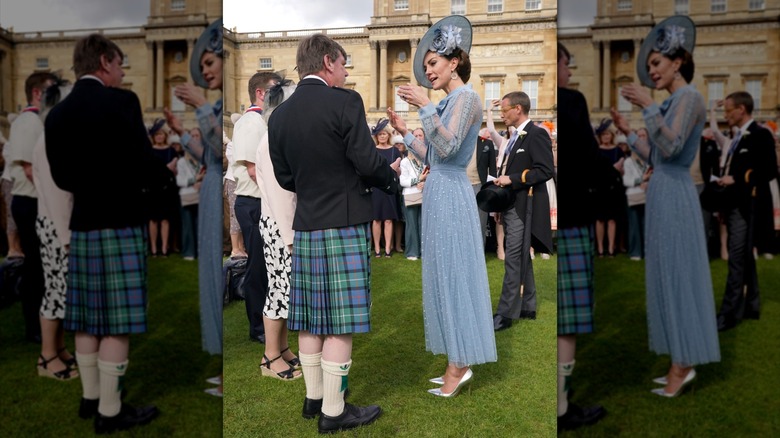 Kate Middleton in a blue dress and heels at a Buckingham Palace garden party