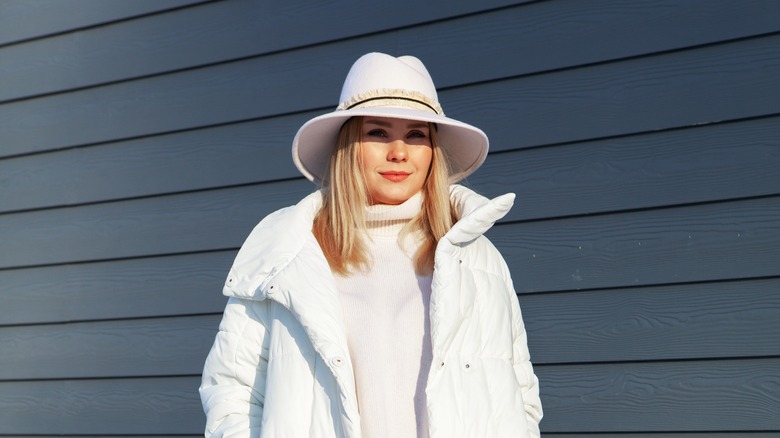 woman in white fedora hat