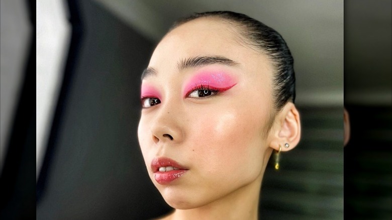 red eyeliner and pink eyeshadow