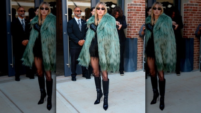 Suki Waterhouse attends a Michael Kors fashion show