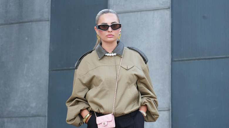 Woman wearing khaki jacket