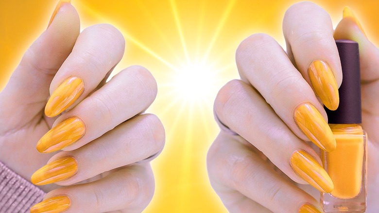 Yellow nails on sunny backdrop