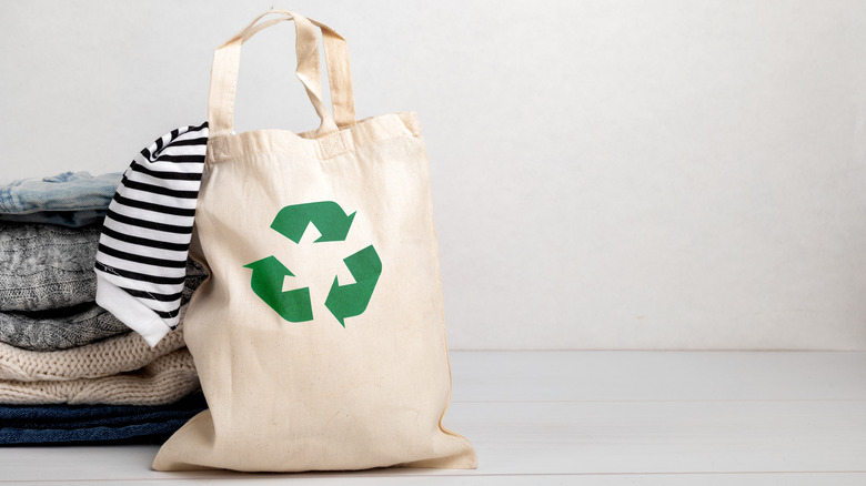 Recycle symbol on clothing bag