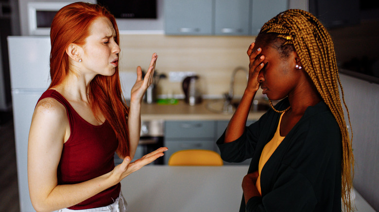 arguing couple in kitchen