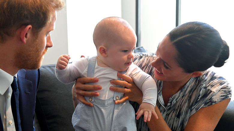 Prince Harry, Meghan Markle and Prince Archie smile together
