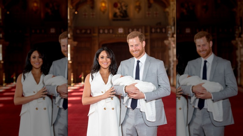 Meghan Markle and Prince Harry holding Prince Archie