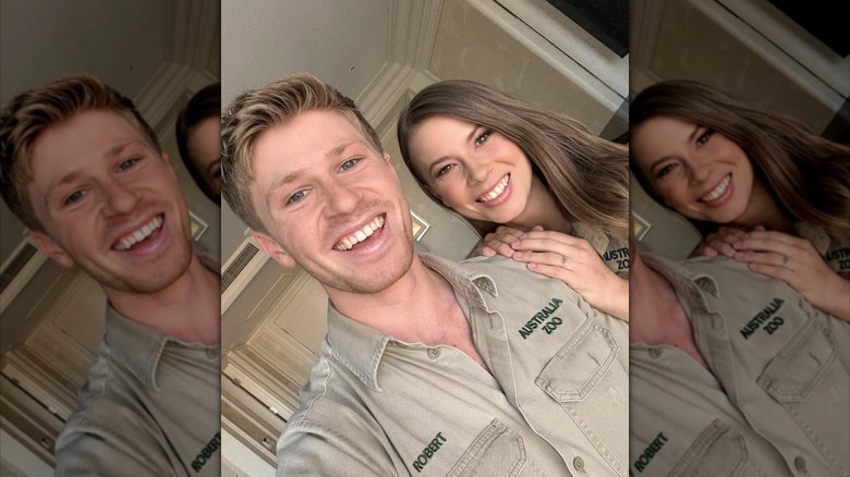 Robert Irwin and Bindi Irwin pose in matching khaki