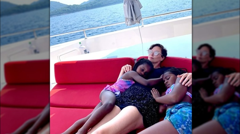 Charlize Theron poses with daughters Jackson and August.