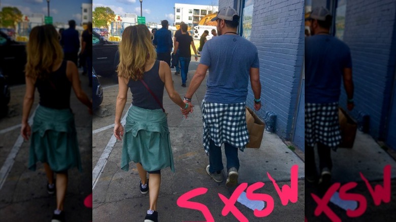 Giada De Laurentiis and Shane Farley hold hands on the street in Austin