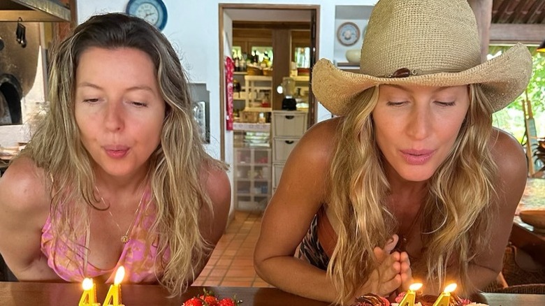 Pati and Gisele Bündchen blow out birthday candles