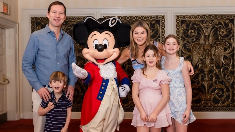 Jenna Bush Hager and her family posing with a colonial-dressed Mickey Mouse.
