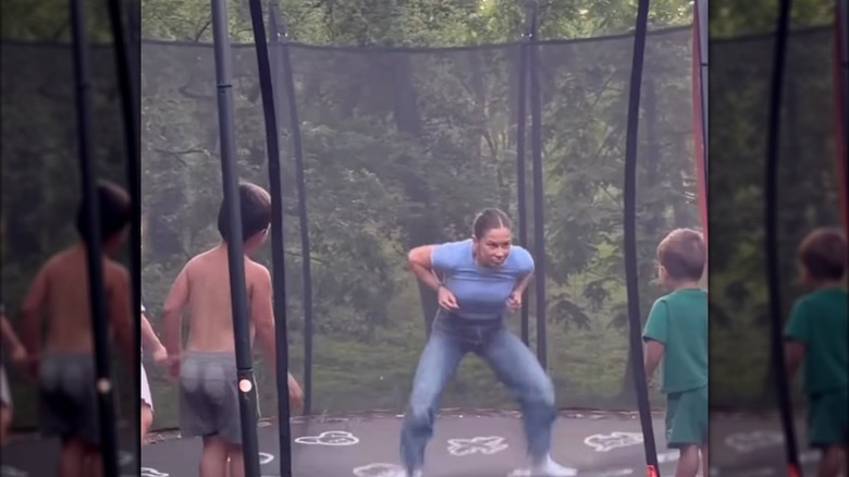 Shawn Johnson bounces on the trampoline