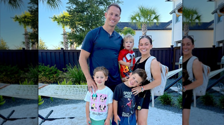 Shawn Johnson, Andrew East, and their kids smile together before a day at Disney World.