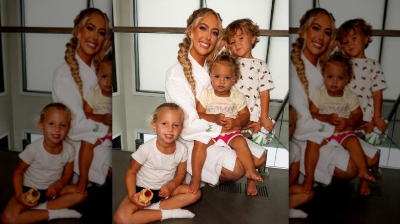 Brittany Mahomes poses with her three children