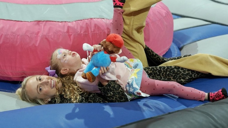 Brittany Mahomes and Sterling cuddle at her birthday party