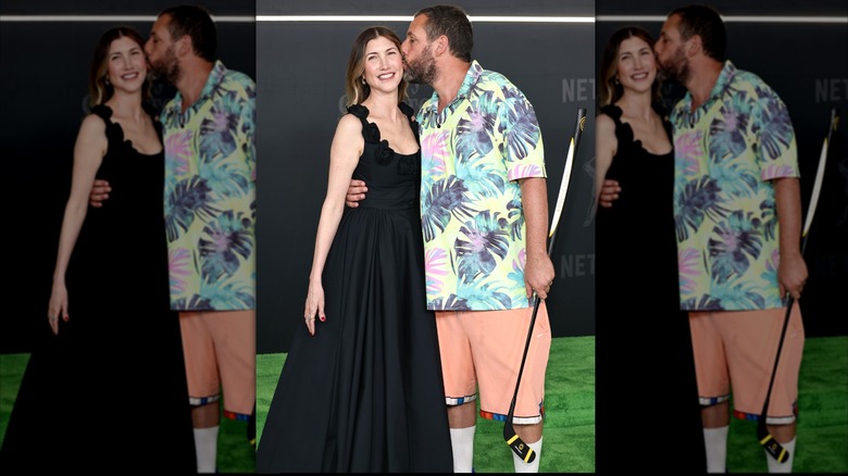 Adam Sandler kisses Jackie Sandler on the cheek