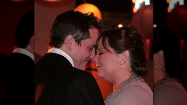 Ben Falcone and Melissa McCarthy embracing