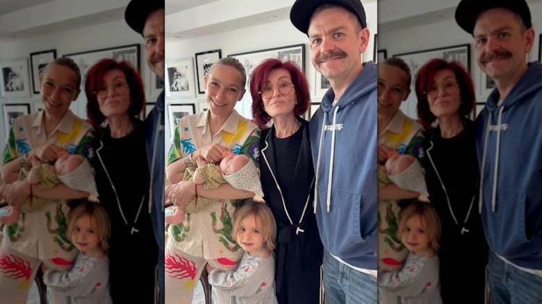 Sharon Osbourne posing with Jack Osbourne, Aree Osbourne, baby Ozzy Osbourne, and Maple Osbourne