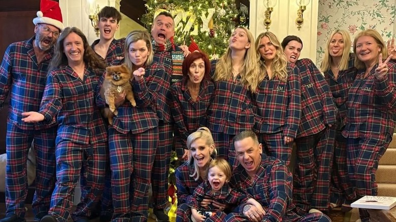 Sharon Osbourne posing with the extended family, including Kelly Osbourne and Sidney Osbourne