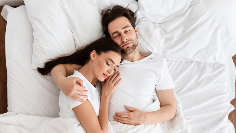 couple sleeping in bed