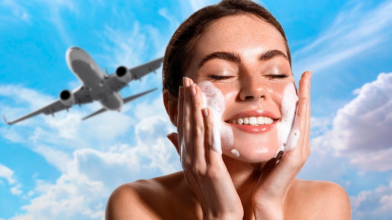 Woman washing face in front of airplane