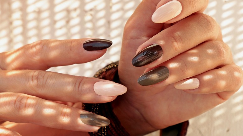Nails painted with Taupe shades