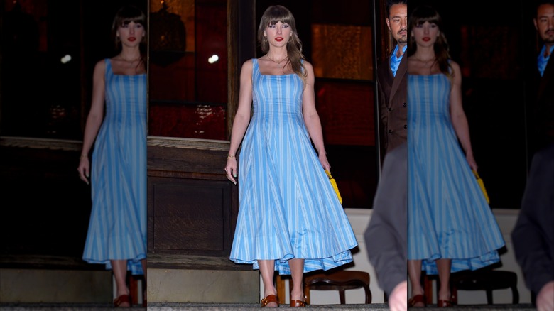 Taylor Swift in a blue striped dress