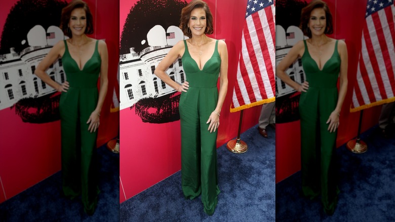 Teri Hatcher in a bright green jumpsuit