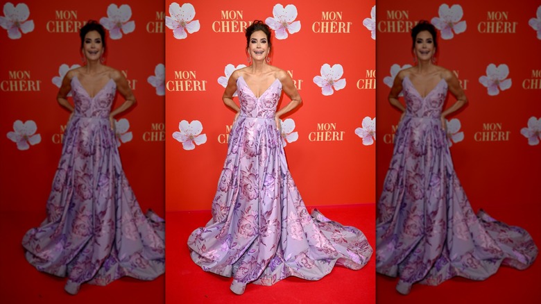 Teri Hatcher in a strapless purple floral gown