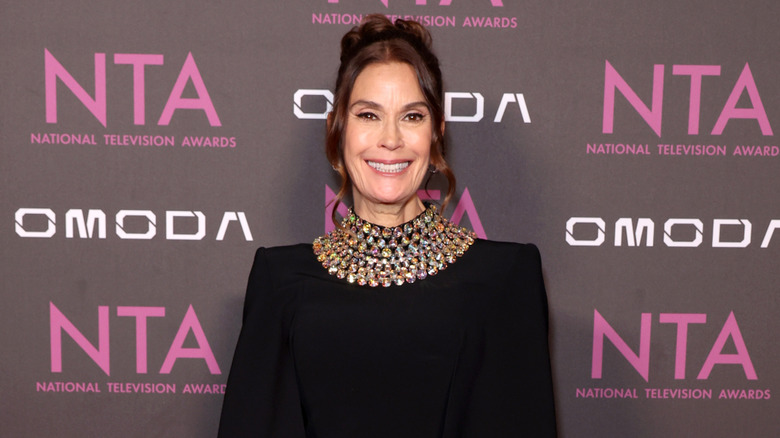 Teri Hatcher in 2026 posing with a beaded statement collar