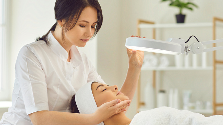 Dermatologist patient examine