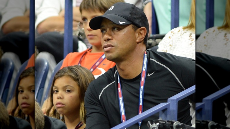 Sam Woods wears her brown hair down while attending the U.S. Open with Tiger Woods in New York City in 2015.