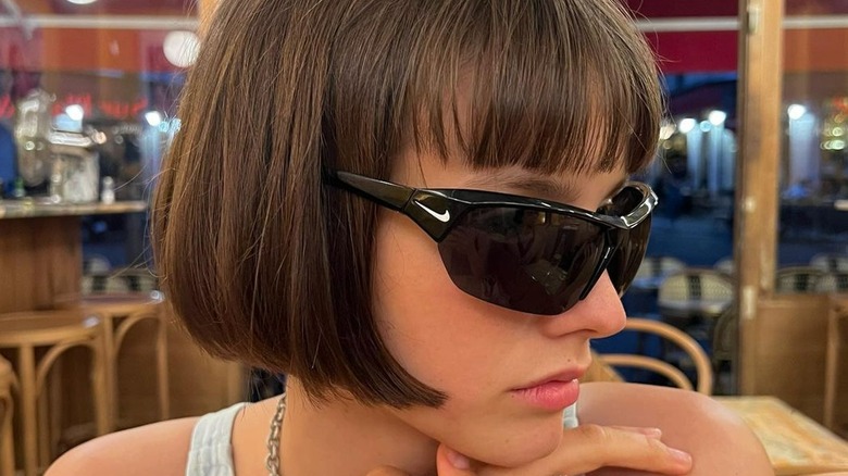 Woman with short sleek bob