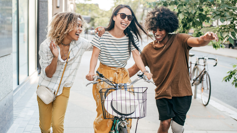 three friends having fun