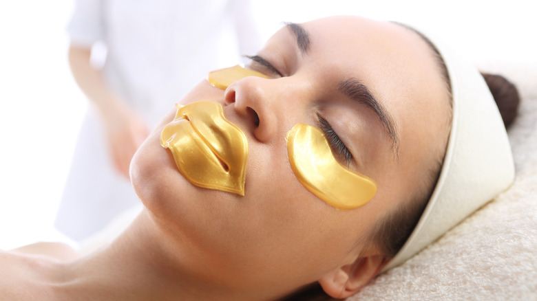 lip mask and eye masks on woman