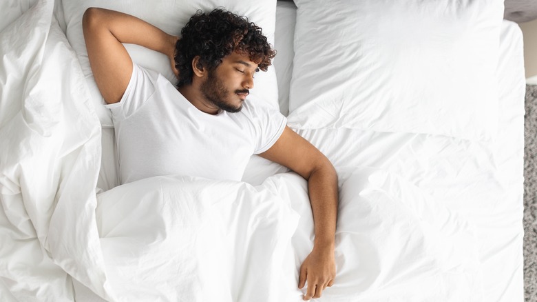 The Benefits Of Sleeping On Your Back And How To Train Yourself To