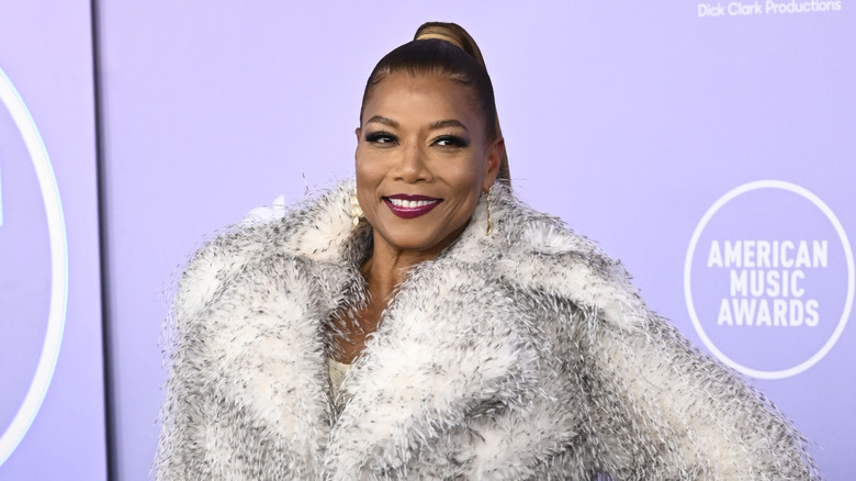 Queen Latifah with a high ponytail