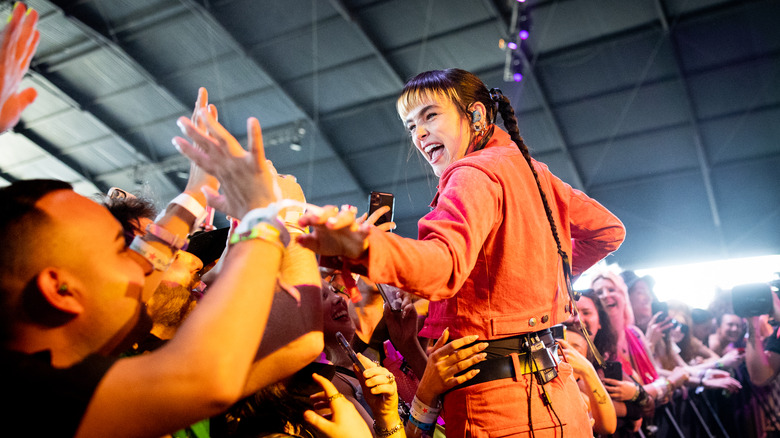 Performer with crowd at Coachella