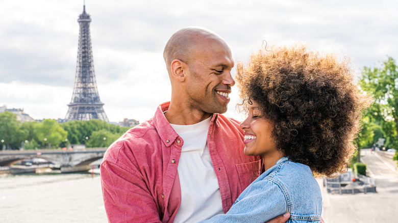 Smiling couple in Paris