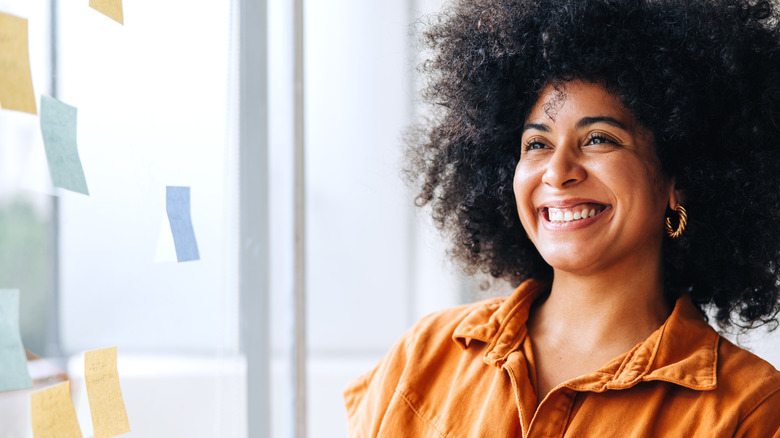 Confident woman smiling