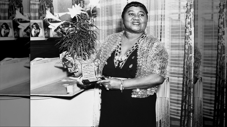 Hattie McDaniel with her Best Supporting Actress Academy Award in 1945