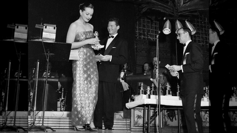 Victoria Shaw wins the Best New Star award at the 13th annual Golden Globes in Los Angeles in February 1956