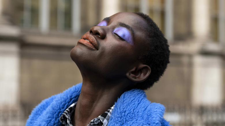 model with purple eyeshadow