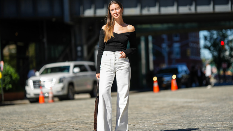 Woman wearing white jeans