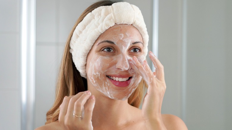 Woman wearing skincare headband 